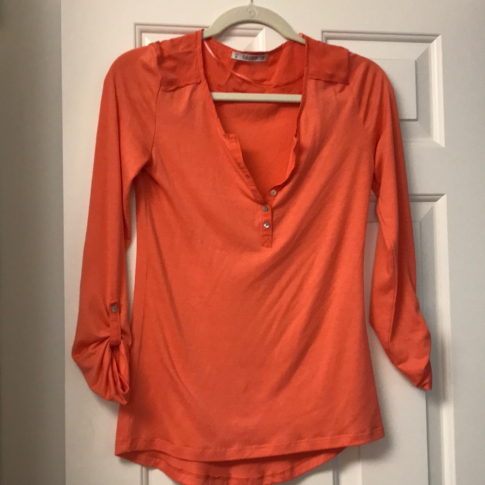 Peach top. Elegant but casual at same time